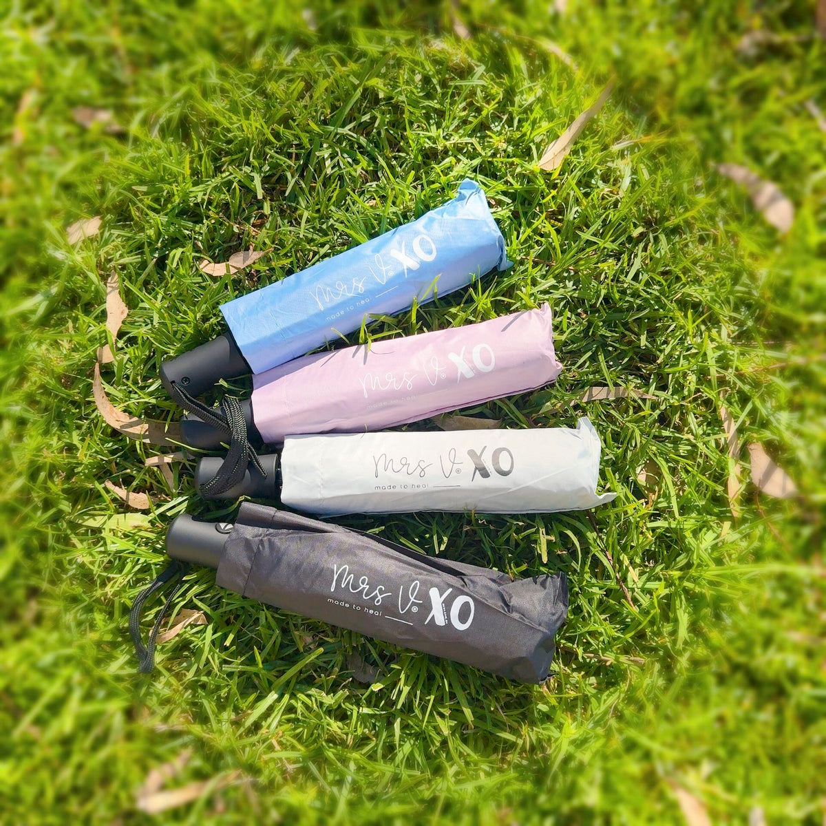 Range of Pretty Umbrellas by Mrs V – Blue, Pink, White, and Black Variants